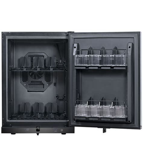 Minibar systems.  The system displays real-time clock data on an LCD, allows users to set Th...