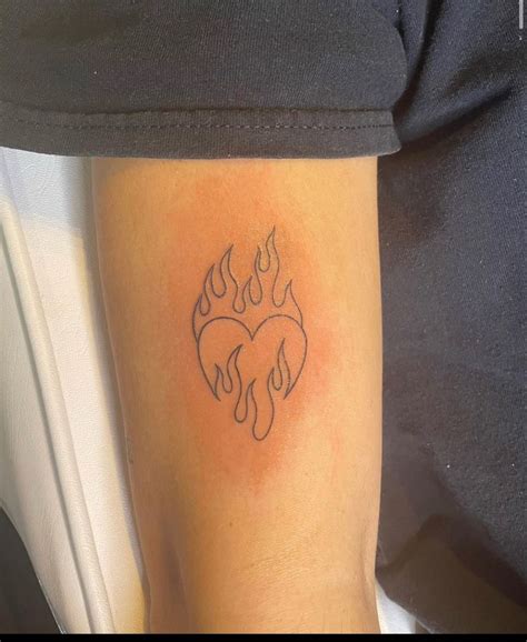Minimalist "Heart On Fire" Tattoo BlackInk AI