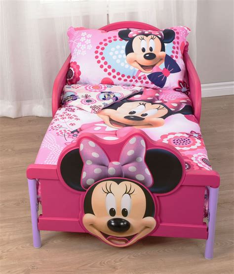 With the delta children Disney Minnie Mouse bow canopy bed you can make your little girl feel like a princess. The sheer canopy is adorned by bow - ribbons and depicts the timeless friendship between Minnie Mouse and Daisy Duck. On the headboard, Minnie Mouse is making a sweet pose while Daisy Duck smiles brightly on the footboard.. 