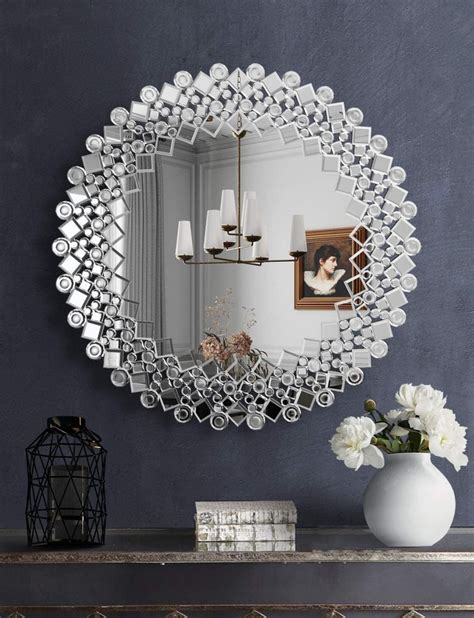 Mirror home. Black Accent Wall with Mirror. Leclair Decor. To keep the matte black dining room wall from feeling too heavy, interior designers Sacha and Melissa Leclair of Ottawa-based Leclair Decor added an oversize round thin-framed mirror that creates a focal point by reflecting light from the otherwise bright, neutral space. 
