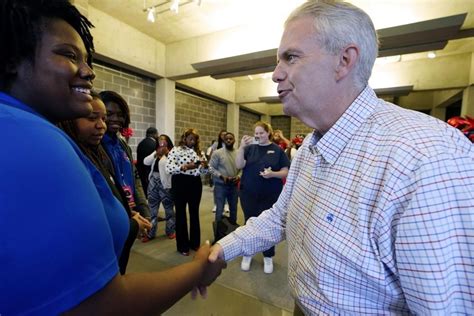 Mississippi voters choose between a first-term Republican governor and a Democrat related to Elvis