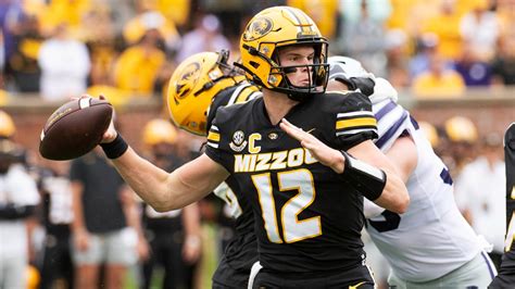 Missouri quarterback Brady Cook endures the home boos and keeps the Tigers on an unbeaten roll