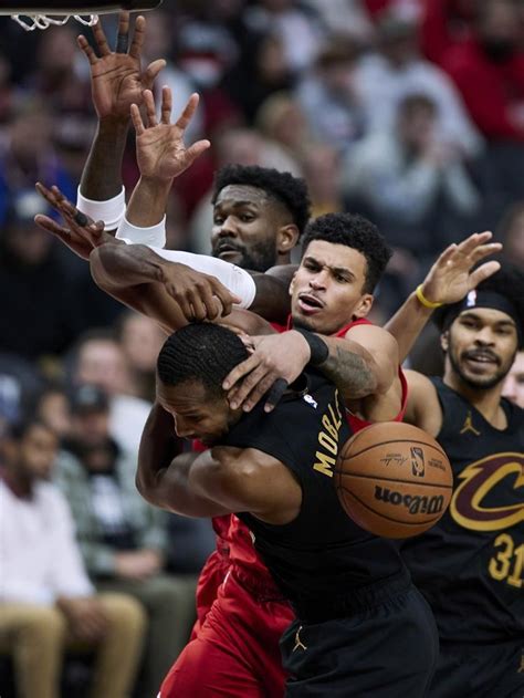 Mitchell has 34 points and Cavaliers end road trip with 109-95 win over Portland