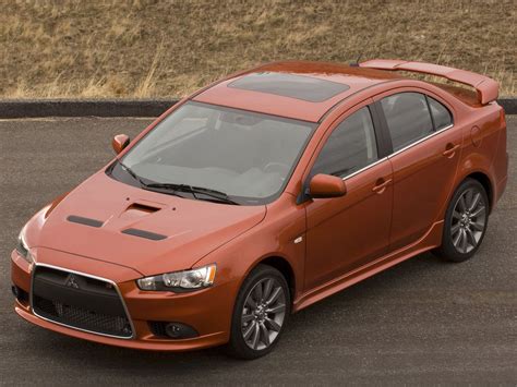 Mitsubishi lancer ralliart. The Ralliart debuts, bringing a 237-horsepower engine, all-wheel drive and an automated-clutch manual transmission to the Lancer lineup. The GTS trim gets more performance via a newly standard 2.4 ... 