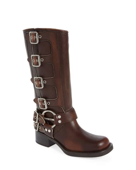 Miu miu moto boots. Suede booties. $ 1,350. Home / Shoes. /. Boots and ankle boots. A refined design, the result of contrasting textures, characterizes these leather boots The buckles running along the side of the boot give it a strong character. The hot-stamped logo decorates this style. 