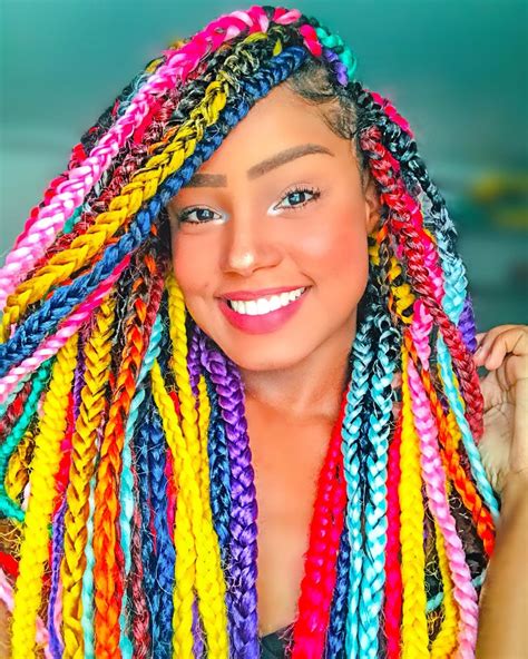 1. Box Braids with Rainbow Color. The first idea we have to show you are these awesome rainbow box braids. These box braids are in a variety of vibrant shades from blue to yellow. Hair like this is perfect for anyone who wants a dramatic and fun new look. Rainbow braids would be great for the summer too.. 
