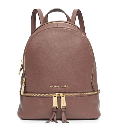 Mk bookbag. Michael Kors Sally Medium Saffiano Leather 2-In-1 Backpack The Sally Medium Saffiano Leather 2-In-1 Backpack features a back tech compartment and front zip pocket for all of your essentials. 