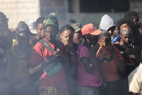 Mob in Haiti capital burns to death 13 suspected gangsters