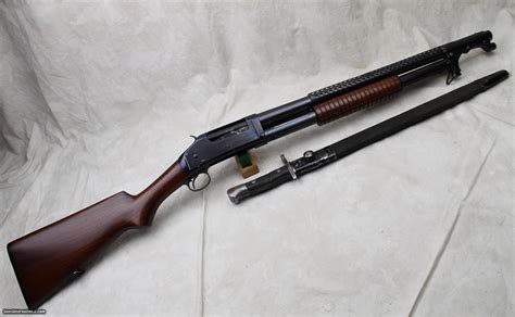 Model 1897 trench gun. The Model 1897 had a 2 9/16″ chamber, was designed for low compression paper shells, had an external hammer, and held six shells in the tubular magazine that ran nearly the entire length of the barrel. Over 1 million shotguns were sold between 1897 and 1957. Compared to a two-shot side-by-side, the pump was a thoroughly innovative and modern ... 