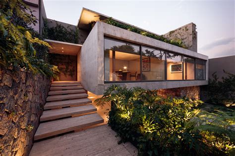 Modern concrete house. Cement dries in stages that take about 30 days to complete. It takes one to two days for cement to dry enough for people to walk on and five to seven days before people can drive o... 