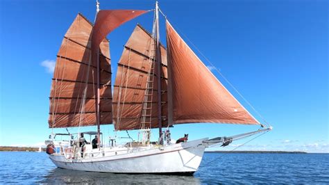 Modern junk rigged sailboat.  [1] Examples include a schooner rig, cutter rig, j...