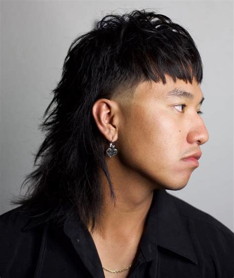Modern mullet asian. No longer a hairstyle reserved for ’80s glam rock bands, celebrities like Rihanna, Barbie Ferreira, and Miley Cyrus have all rocked the modern mullet in recent years. Like its older counterpart ... 