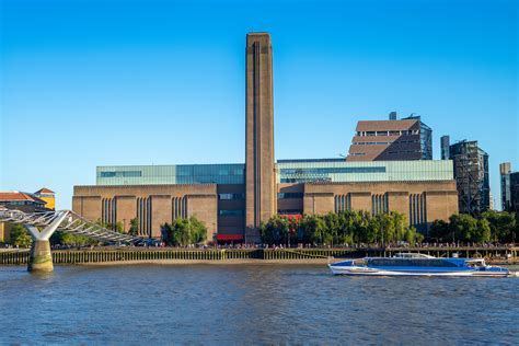 Modern tate. Tate Modern. Tate Modern is a modern art gallery located in London. It is Britain's national gallery of international modern art and forms part of the Tate group (together with Tate Britain, Tate Liverpool, Tate St Ives and Tate Online). It is based in the former Bankside Power Station, in the Bankside area of the London Borough of Southwark. 