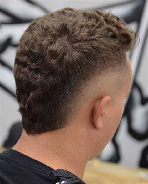 Mohawk burst fade. High taper round lineup in back. it’s just a high taper without the back bro. the photoshop is crazy. High taper. More of a mullet than anything even if the back is short and rounded. Definitely not a burst fade, which is almost basically the same as a mohawk. Yes. 