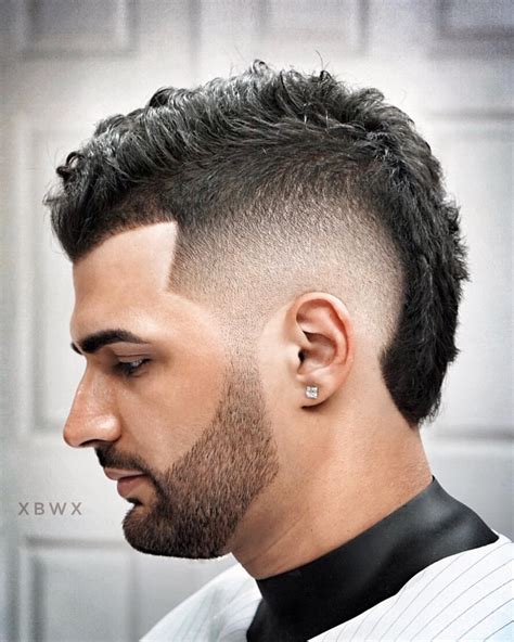 Mohawk with a taper fade. 