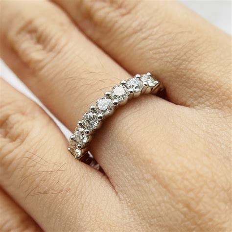 Moissanite eternity band. Real Moissanite Eternity Band Wedding Ring Diamond Test 14k Gold Over 925 Silver. $53.95 - $232.95 Gorgeous mens or ladies moissanite eternity band rings Available in 2mm 3mm 4mm or 5mm...sizes 4-12 so get matching bands for you and a loved one! Great as wedding bands or as stacked rings! Stack 2x 3x for an iced look! 