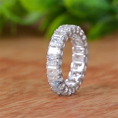 Moissanite wedding band. A moissanite wedding band extends the beauty when wore with the significant engagement ring, but when the wedding band is worn alone it becomes the most subtle piece of jewelry. The most wholesome trait of a moissanite wedding band is that it is beautiful on its own, just like at any occasion of decent attires, a wedding band could be ... 