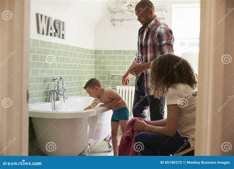 th?q=Mom and father in bathroom