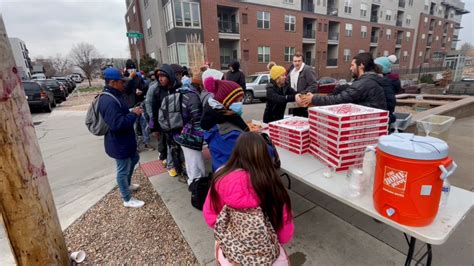 Mom group feeds Denver migrant families living on the streets