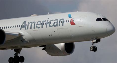 Mom sues American Airlines, claims kids were kept in 'jail-like room' at airport