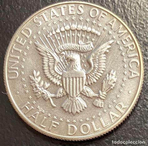 Algunas piezas de 25 centavos de Estados Unidos s