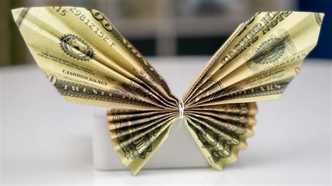 Money butterfly origami. This dollar bill butterfly is created by Ed Halley, hints and text-instructions can be found in his web site. Valley folds in blue; Mountain folds in red. Valley fold a US dollar bill in half from left to right, unfold. Bring the top … 