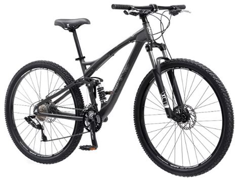 Mongoose professional mountain bike. The Salvo Sport 29er is a full suspension MTB perfect for smooth XC trail riding. Suggested rider height by size: SM: 5'2" – 5'6", MD: 5'5" – 5'10", LG: 5'9" – 6'2. Stiff, lightweight Tectonic T2 aluminum frame featuring tapered headtube, 110 mm travel, rocker link suspension, internal cable routing, replaceable hanger, and adaptable ... 