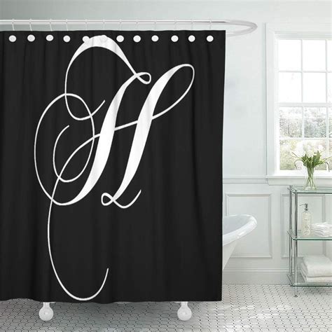 Monogram shower curtains.  Keep your floor dry & safe from mildew wi...