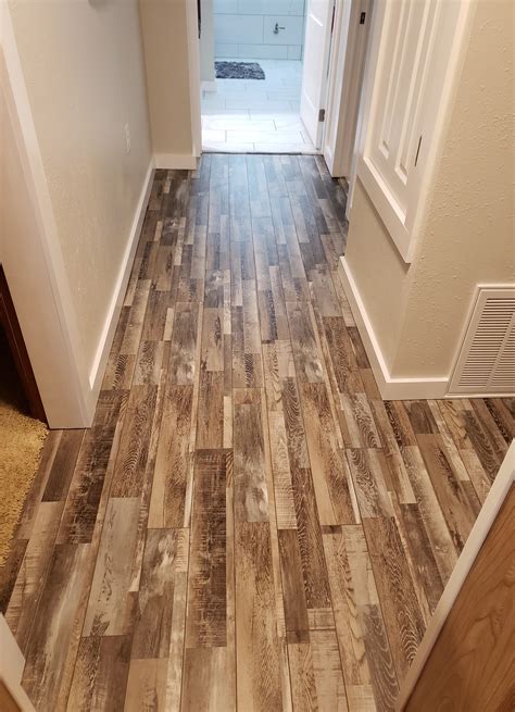 SMARTCORE. Ultra XL Chadwick Oak 12-mil x 9-in W x 72-in L Interlocking Luxury Vinyl Plank Flooring (17.96-sq ft/ Carton) Model # LX93705108. 27. • SMARTCORE Ultra XL is the smart choice for longer + wider hi-def style and design that is 100% waterproof, so it won't swell, crack or peel when exposed to water..