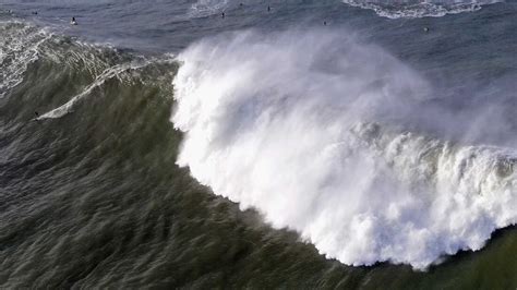 Monster waves pound California, Hawaii