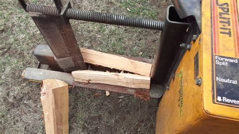 lever side of the log splitter and stabilize log as shown, if needed. See Fig. 2-1. b. Vertical Operating Position: Stand in front of the log splitter and stabilize log as shown, if needed. See Fig. 2-1. WARNING! When stabilizing log with left hand, remove your hand when the wedge just contacts the log or serious injury may occur. 7.. 