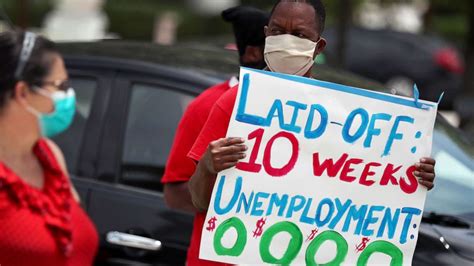 More Americans file for jobless claims; layoffs remain low