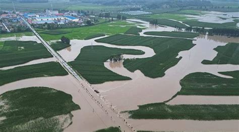 More people go missing and thousands are evacuated as northeast China is hit by more floods