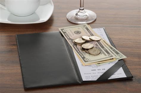 More restaurants are tacking sneaky fees onto bills