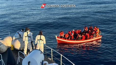 More than 1,400 migrants are rescued from overcrowded boats off southern Italy by coast guard