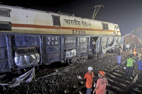 More than 230 killed and 900 hurt after 2 trains derail in India. Hundreds are still trapped.