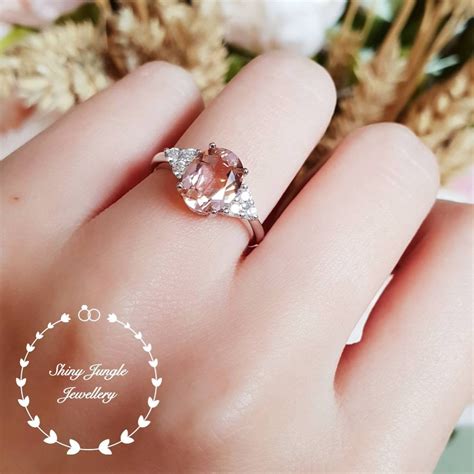 Morganite engagement rings. One, the heating of the stone produces a more blush worthy pink color. Two, the heating of the stone makes the color stable and unaffected by elements such as intense heat. So, if you find a Morganite with a yellowish influence, it is probably a natural color. A stone with a violet or pink hue has probably been heated. 