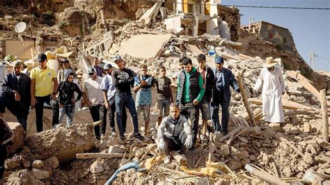 Moroccan soldiers and aid teams battle to reach remote, quake-hit towns as toll rises past 2,400
