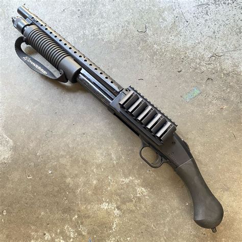 Sale. $36.00. $40.00. Shipping in the United States is always FREE! Color. Quantity. Add to Cart. Rubber over-molded forend with built in finger guards and flush-mount strap add comfort, control, and prevent finger burns and pinching. Compatible with Mossberg Shockwave 12-gauge firearms with 6-3/4" action slide (See below).