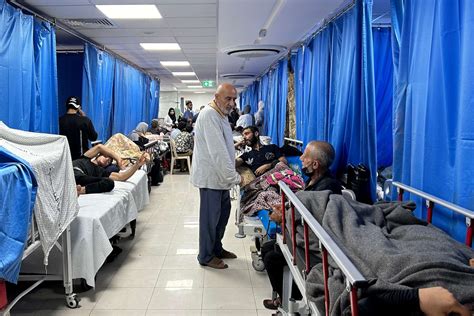 Most Shifa Hospital patients, staff and displaced leave as Israel strikes Gaza’s north and south
