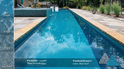 Pebble Sheen Blue Surf is a popular color option from the Pebble Tec line of pool finishes. It is a vibrant blue color with tiny pebble aggregates that create a visually appealing texture and shimmering effect when submerged in water. The Blue Surf option is known for providing a refreshing and luxurious look to any pool.