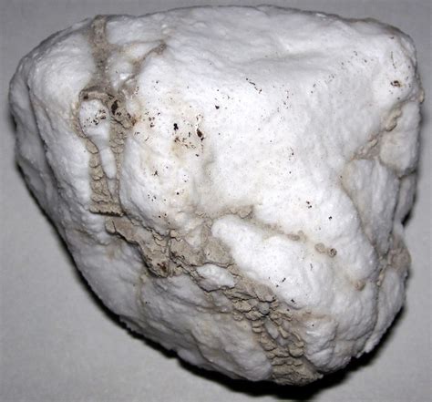 Most rock gypsum is formed by the. It forms in lagoons where ocean waters high in calcium and sulfate content can slowly evaporate and be regularly replenished with new sources of water. The result is the accumulation of large beds of sedimentary gypsum. Gypsum is commonly associated with rock salt and sulfur deposits. arrow right. Explore similar answers. 