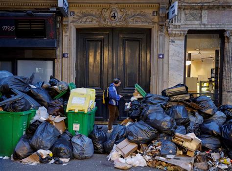 Mostly calm on Paris streets, garbage still piling up