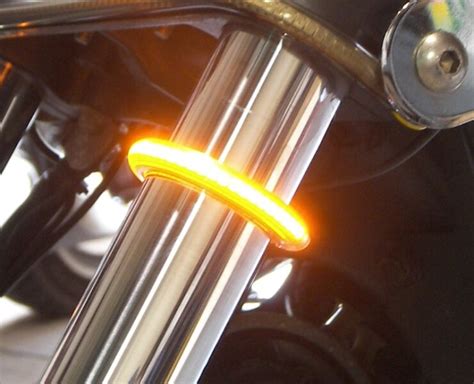 Motorcycle fork turn signals.  They provide a visual indicator of the direction th...