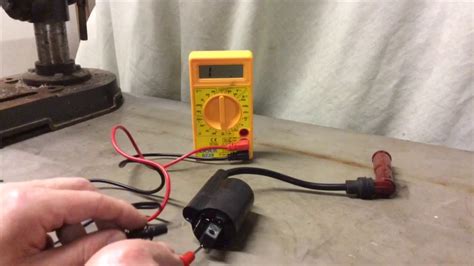 Motorcycle ignition coil test.  The trigger coil tells the black Testing an ignit...