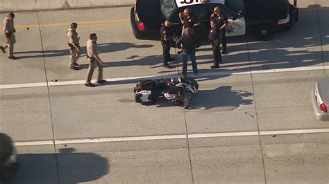 Motorcycle officer injured by alleged hit-and-run driver on L.A. freeway