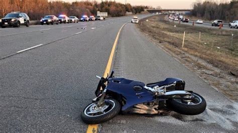 Motorcycle rider seriously injured after crashing into pickup truck in Aurora