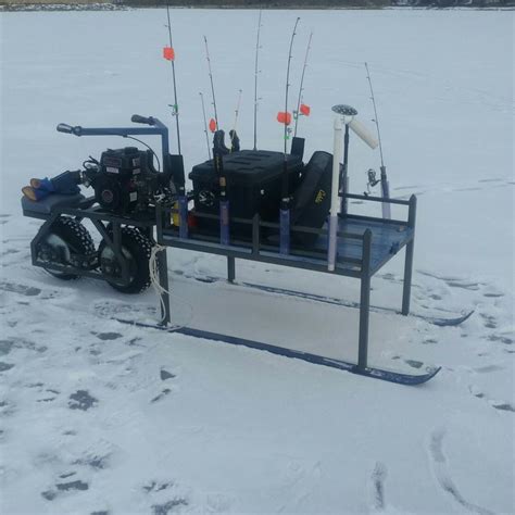 Motorized ice fishing sled. 