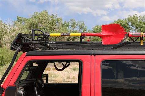 Item J110529. ExtremeTerrain no longer carries the Garvin Single Axe or Shovel Mount for 4-Inch High Roof Rack. Please check out Jeep CJ7 Offroad Storage & Tool Boxes (1976-1986) for an updated selection. Verify parts fit and get product recommendations. Wrangler Sales Techs: Connect Now M-F 8:30A-11P, Sat-Sun 8:30A-9P.. 
