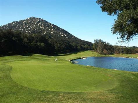 Mount woodson golf course. Mt. Woodson Golf Club is a par 70 course with bermuda grass fairways and greens, designed by Lee E. Schmidt and Brian Curley. It offers scenic views, practice facilities, and a 19th hole patio dining area. 